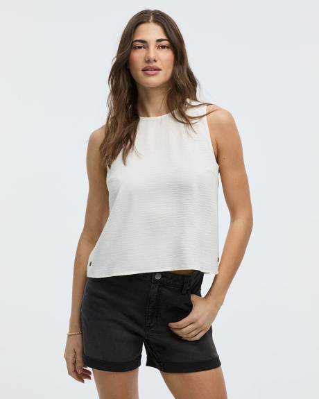 Blouse sans manches courtes avec boutons sur les côtés