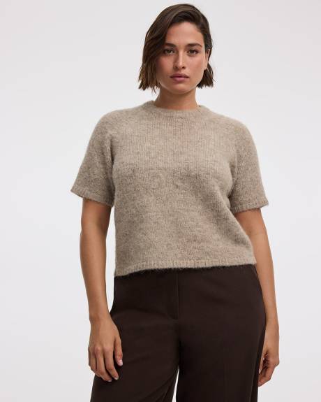 Pull ample à manches aux coudes et col rond