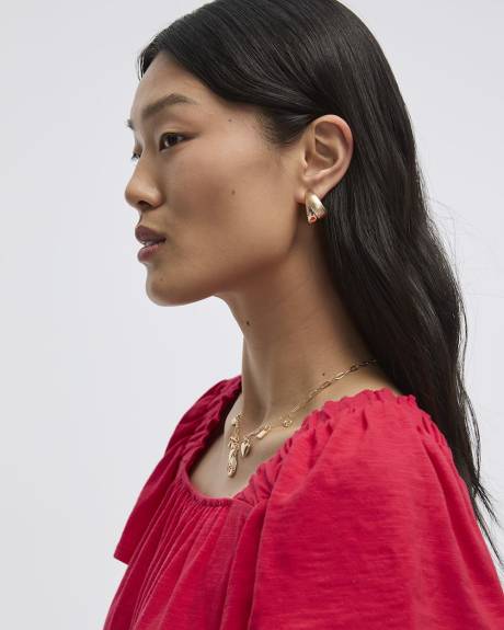 Blouse à col carré et manches courtes à volants