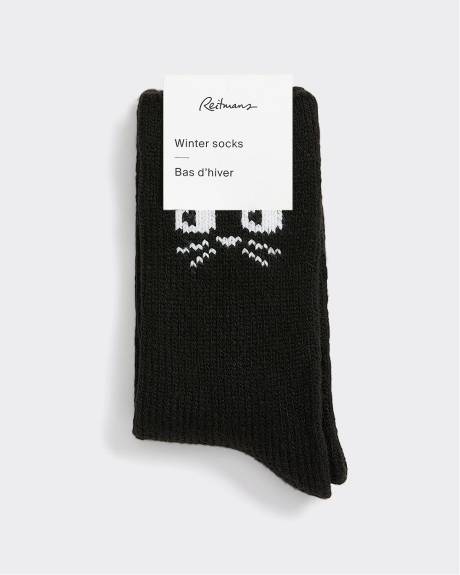 Bas d'hiver avec chat à l'ourlet