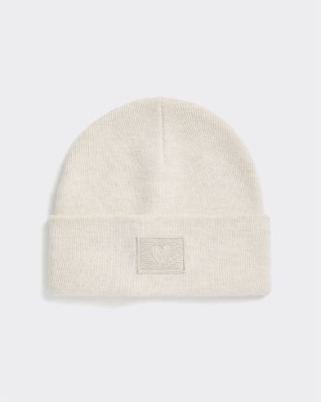 Tuque à revers avec écusson brodé