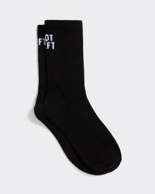 Bas côtelés avec « Bavarde » à l'ourlet