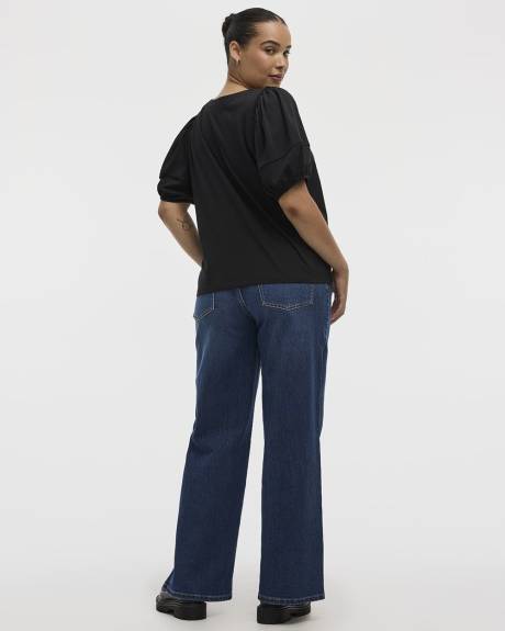 Haut à manches aux coudes bouffantes et col rond