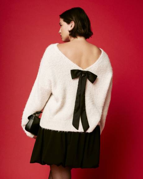 Pull à manches longues et col rond avec boucle