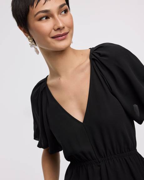 Blouse à manches courtes bouffantes et col V