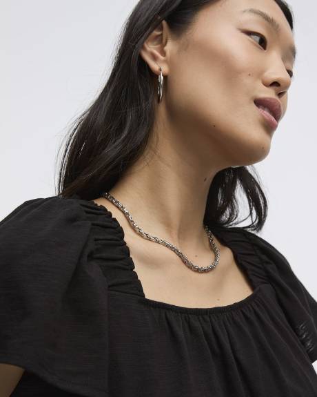 Blouse à col carré et manches courtes à volants