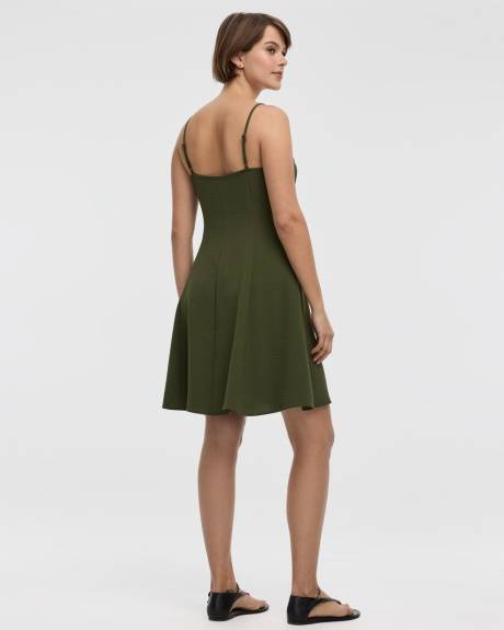 Robe courte à boutonner sans manches