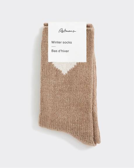 Bas d'hiver avec coeur à l'ourlet