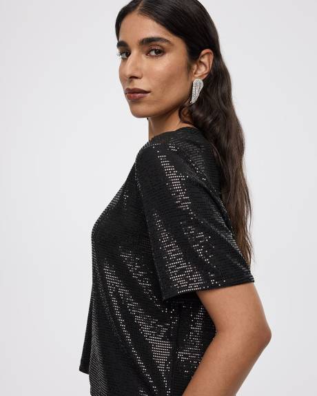 Haut à paillettes à manches courtes et col rond