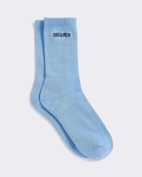 Bas côtelés avec mot à l'ourlet